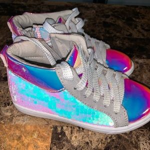 Cuddle and carry with sneakers